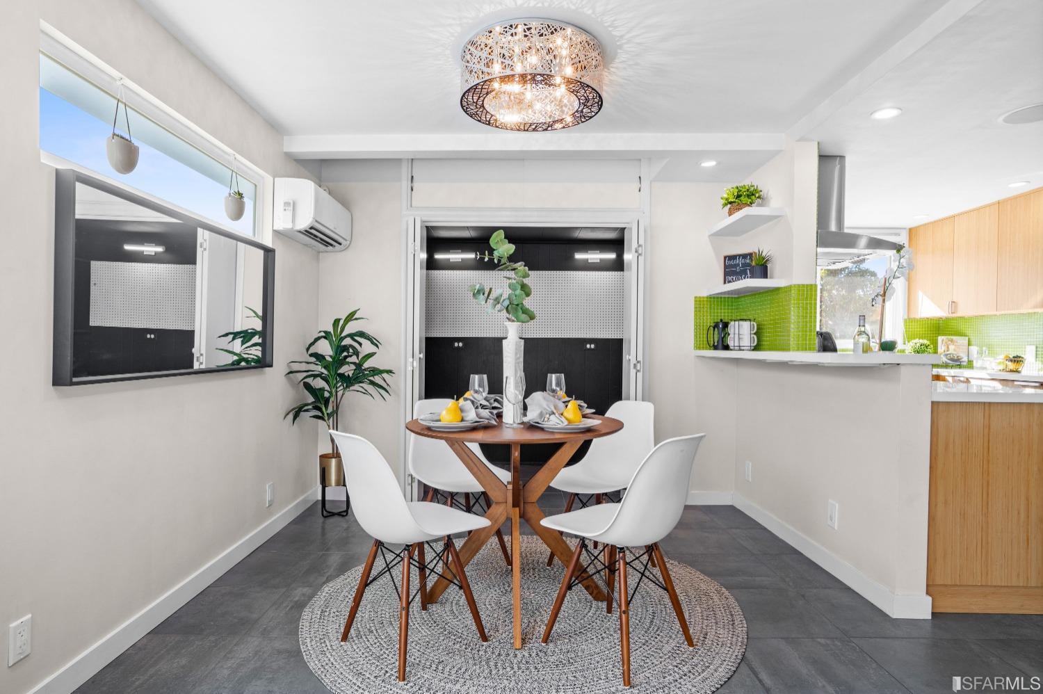 1854 Key Boulevard El Cerrito, CA 94530 - Photo 14 of 43 a dining room with furniture potted plants and wooden floor