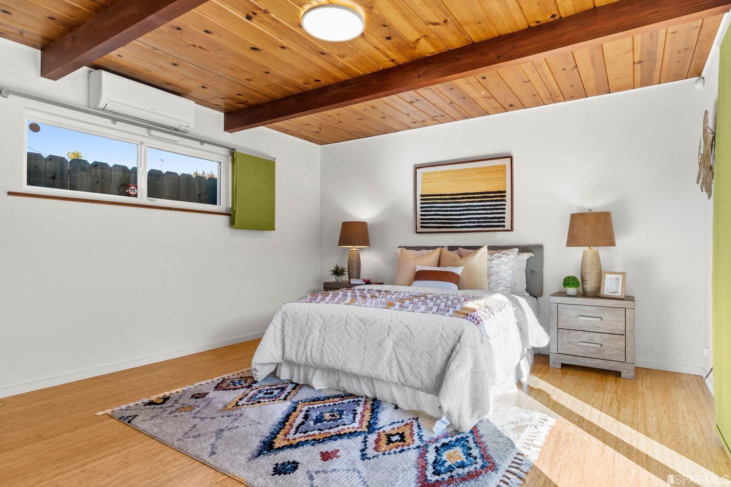 1854 Key Boulevard El Cerrito, CA 94530 - Photo 26 of 43 a bedroom with bed and a window