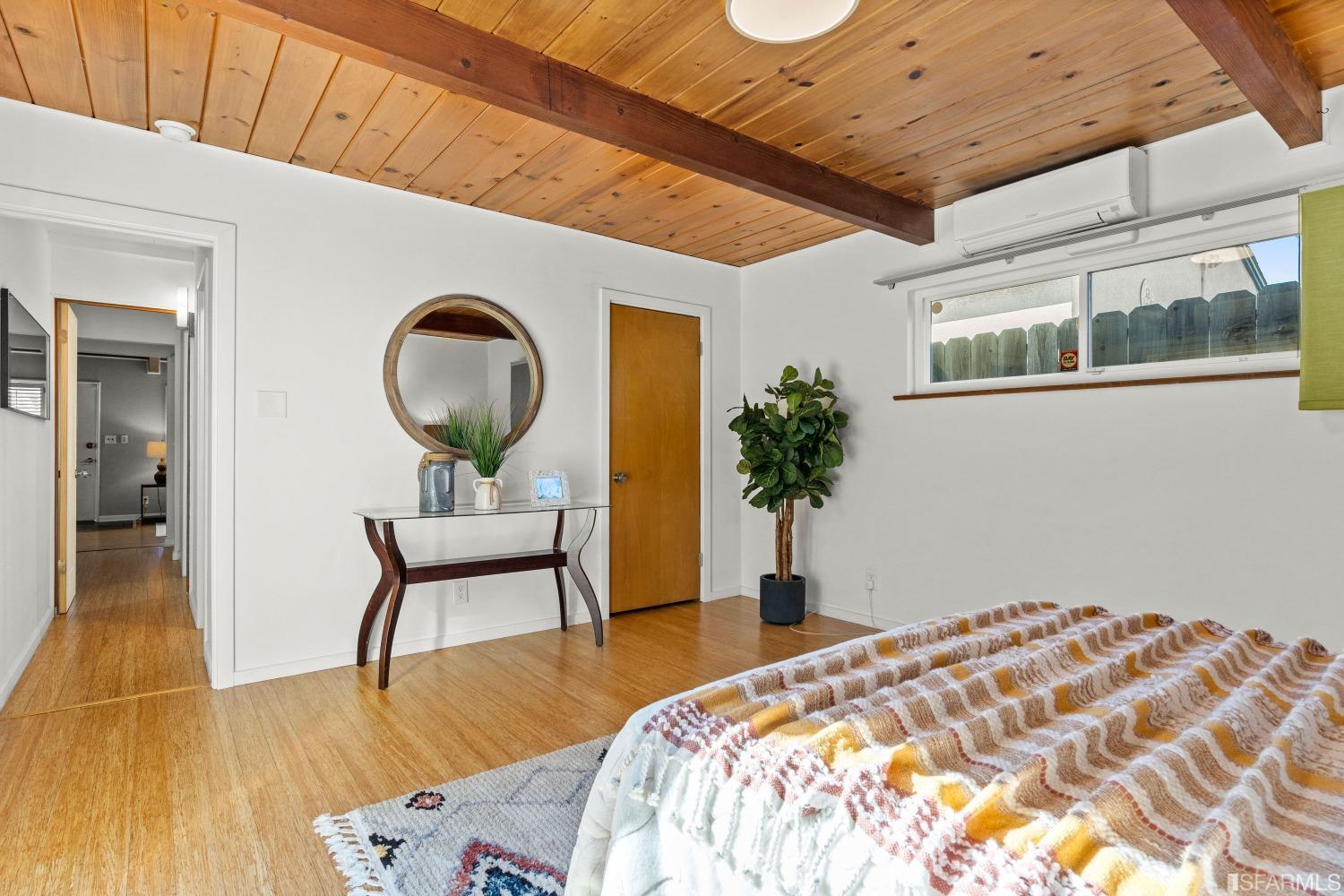 1854 Key Boulevard El Cerrito, CA 94530 - Photo 27 of 43 a bedroom with a bed and a potted plant