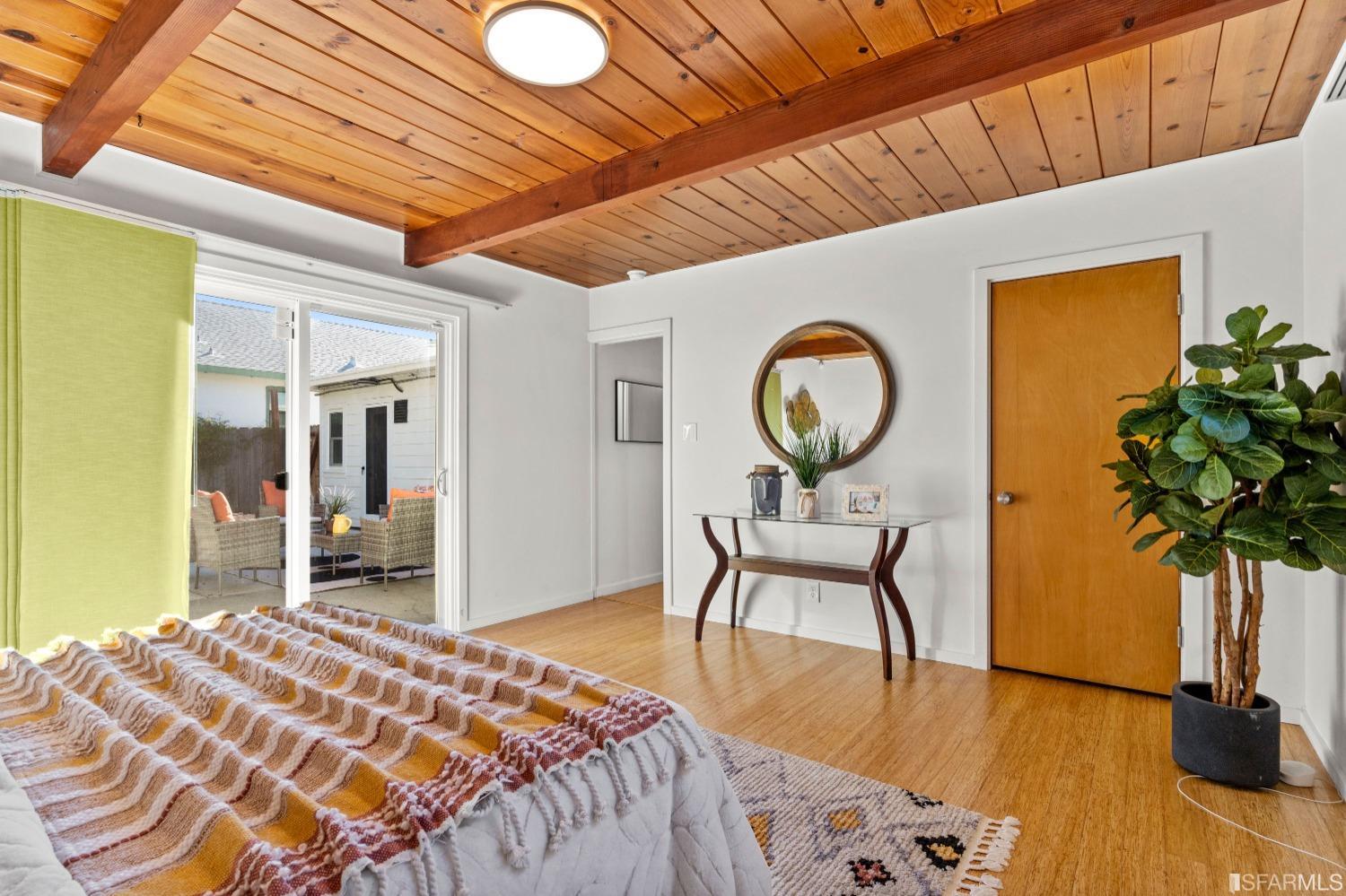 1854 Key Boulevard El Cerrito, CA 94530 - Photo 29 of 43 a bedroom with bed and a table