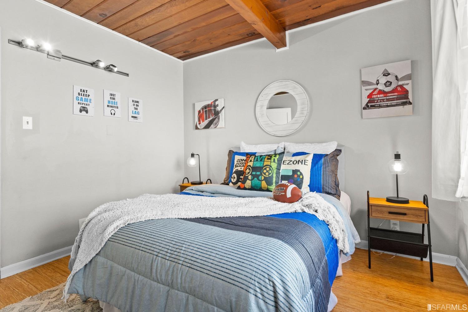 1854 Key Boulevard El Cerrito, CA 94530 - Photo 35 of 43 a bedroom with bed and wooden furniture