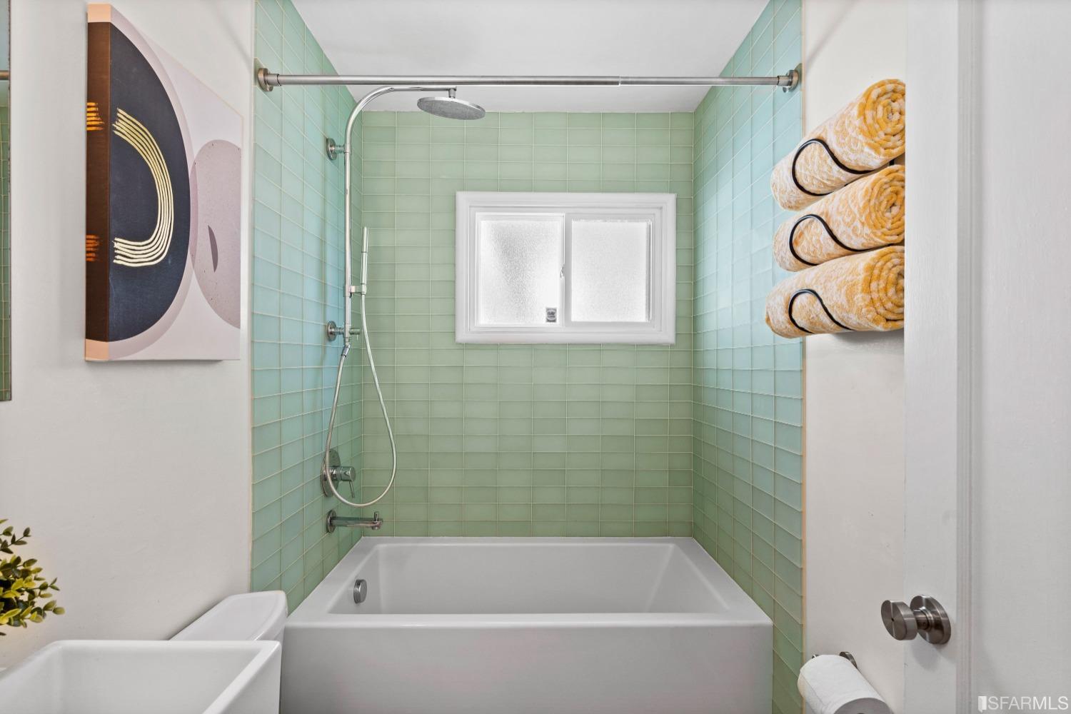 1854 Key Boulevard El Cerrito, CA 94530 - Photo 37 of 43 a bathroom with a bathtub and a shower