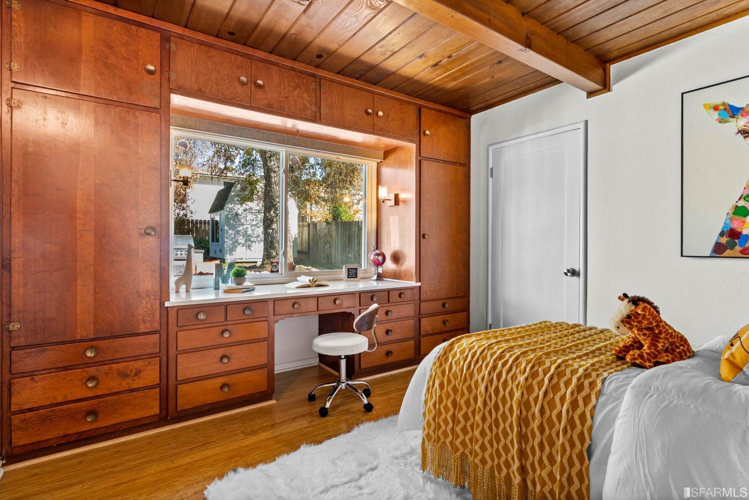 1854 Key Boulevard El Cerrito, CA 94530 - Photo 38 of 43 a bedroom with a bed and a windows