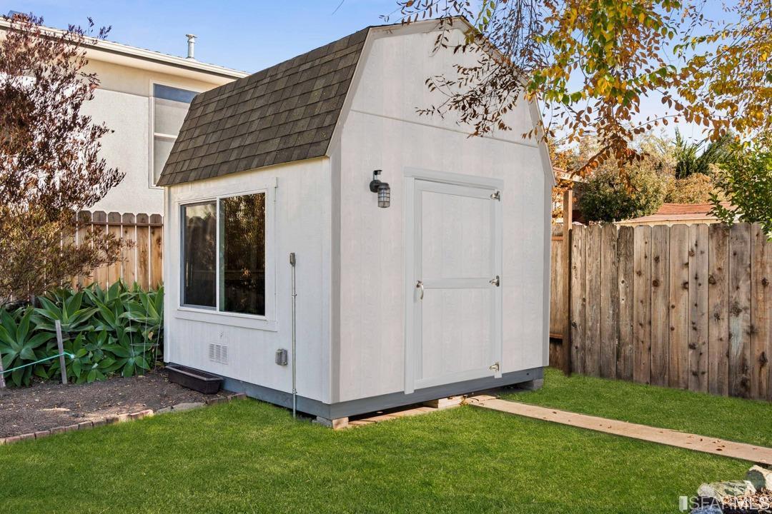 1854 Key Boulevard El Cerrito, CA 94530 - Photo 6 of 43 a view of backyard with potted plants and a palm tree