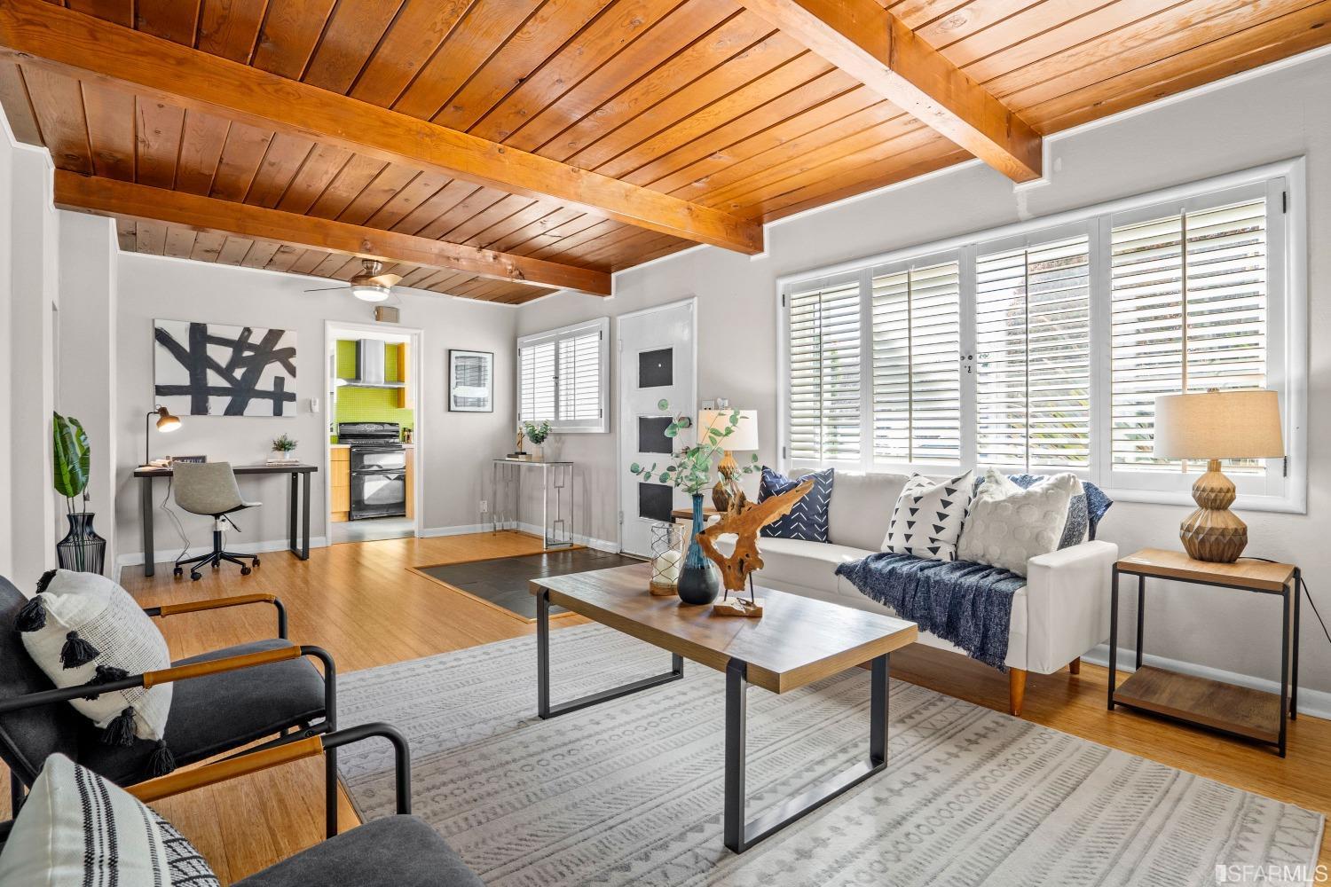 1854 Key Boulevard El Cerrito, CA 94530 - Photo 8 of 43 a living room with furniture a table and wooden floor