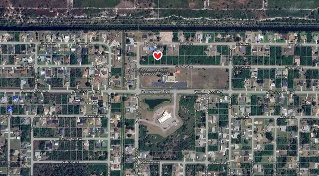 a front view of a building with glass windows