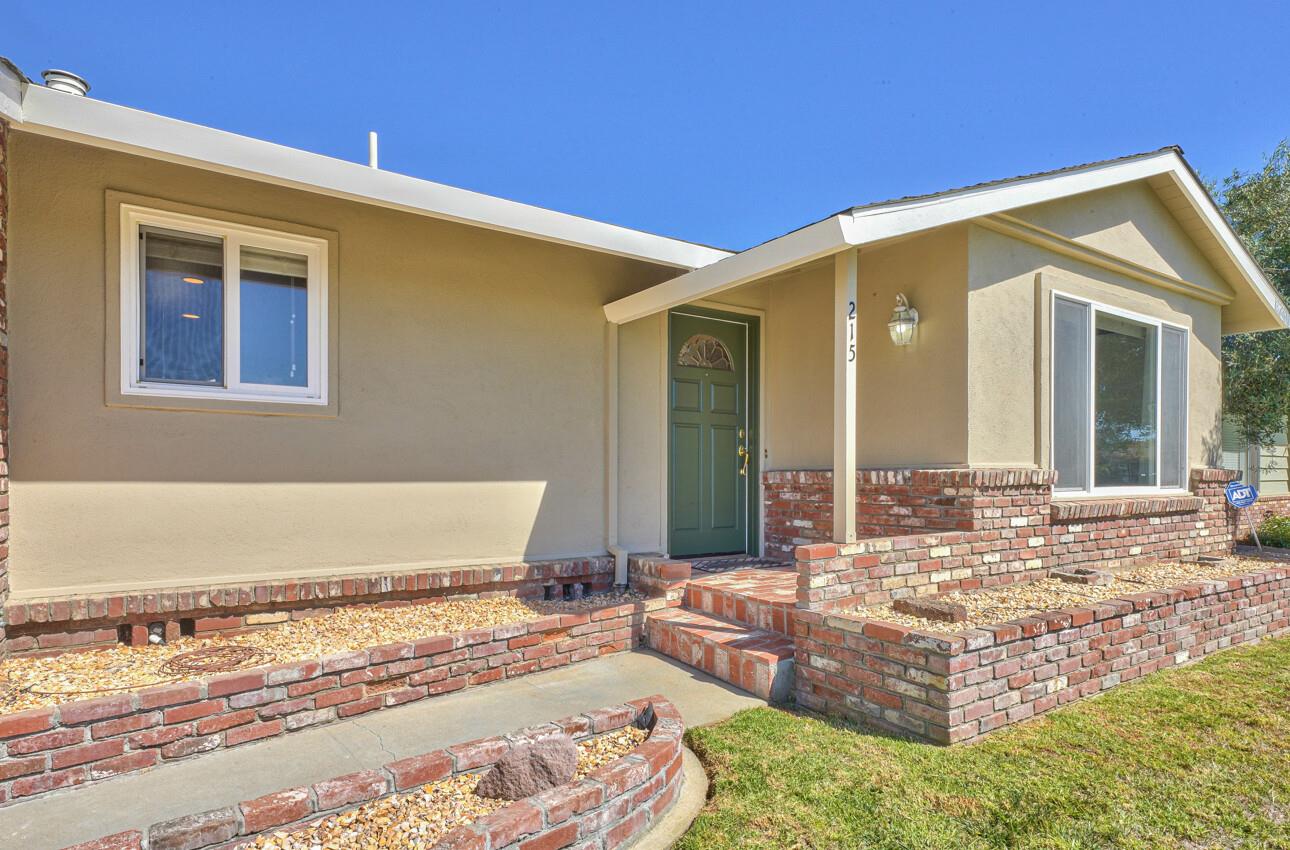 215 Encinada Drive Salinas, CA 93901 - Photo 3 of 32 a living room with couches flat screen tv and couches with wooden floor