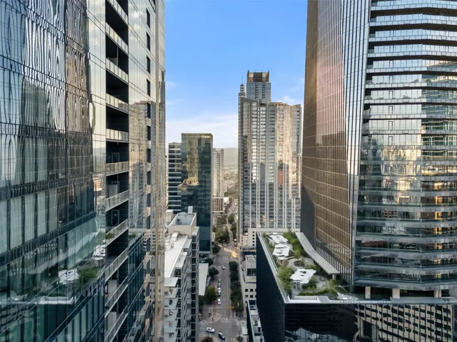 a view of a city with tall buildings