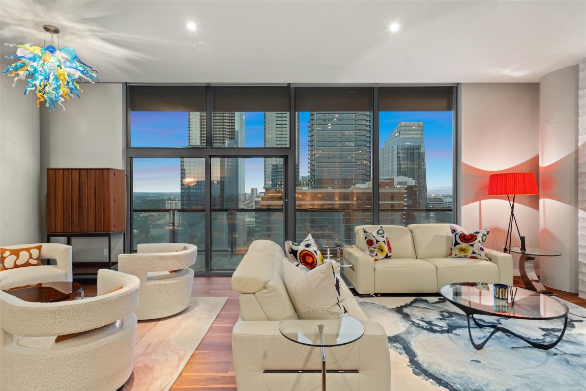 210 Lavaca Street, Unit 2505 Austin, TX 78701 - Photo 25 of 40 a living room with furniture and a potted plant