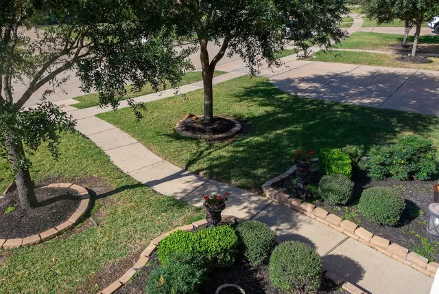 a view of a yard with a lake view