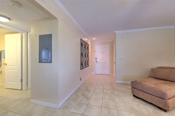 a view of hotel room with a bed furniture and a window