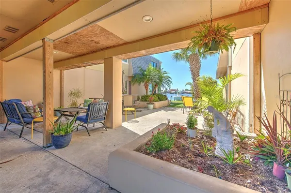 an aerial view of a house with a ocean view