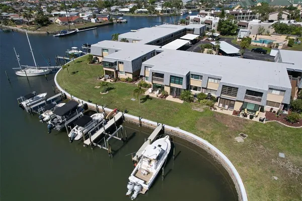 an aerial view of a house with a ocean view