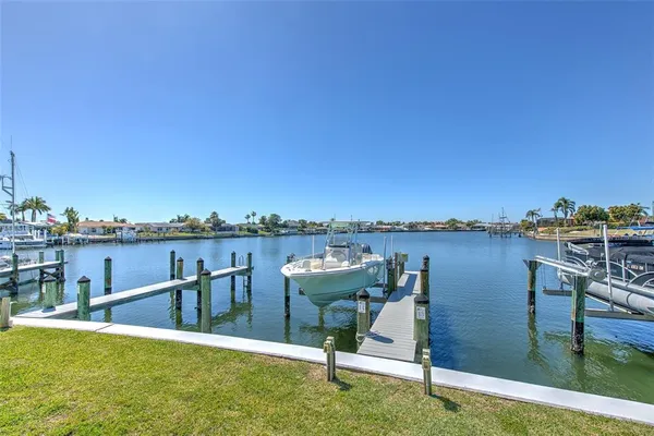 an aerial view of a house with a ocean view