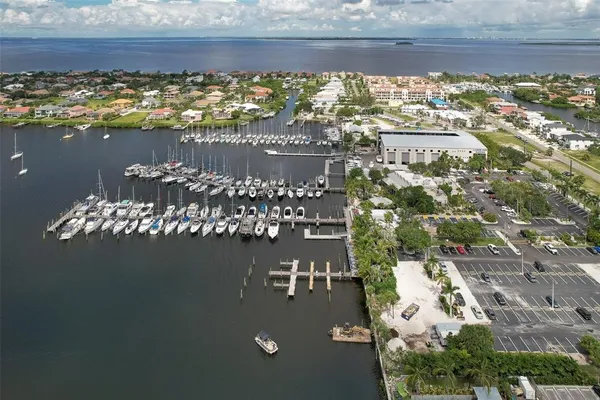 a view of a big yard with an outdoor seating