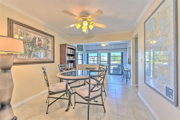 a living room with fireplace furniture and a book shelf