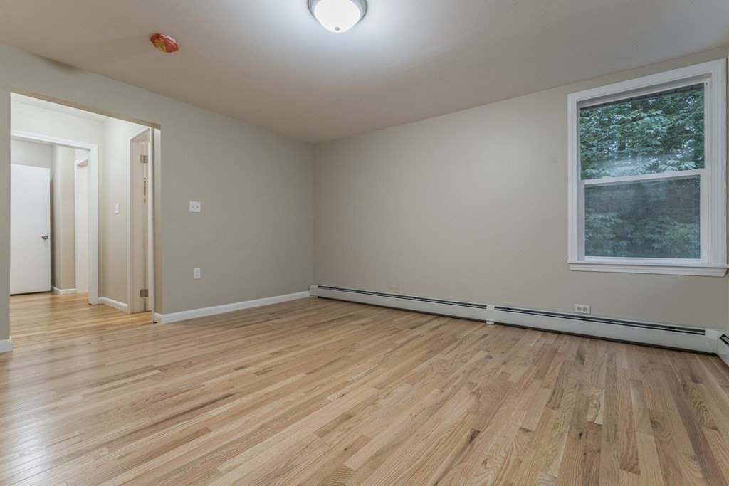 20 Laurelwood Road Rutland, MA 01543 - Photo 13 of 31 a view of an empty room with wooden floor and a window