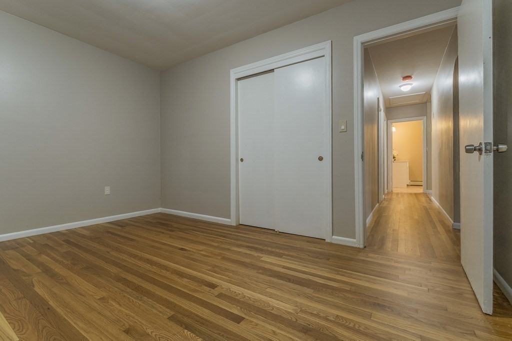 20 Laurelwood Road Rutland, MA 01543 - Photo 14 of 31 a view of an empty room with wooden floor and a bathroom