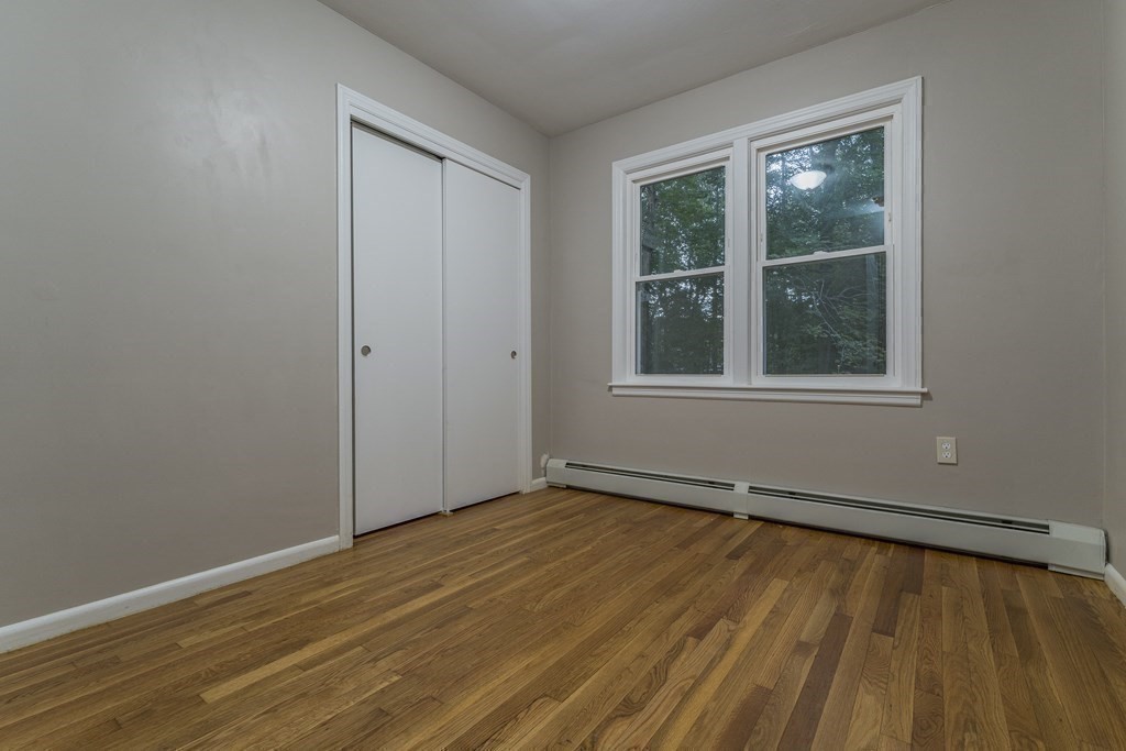 20 Laurelwood Road Rutland, MA 01543 - Photo 16 of 31 an empty room with wooden floor and windows