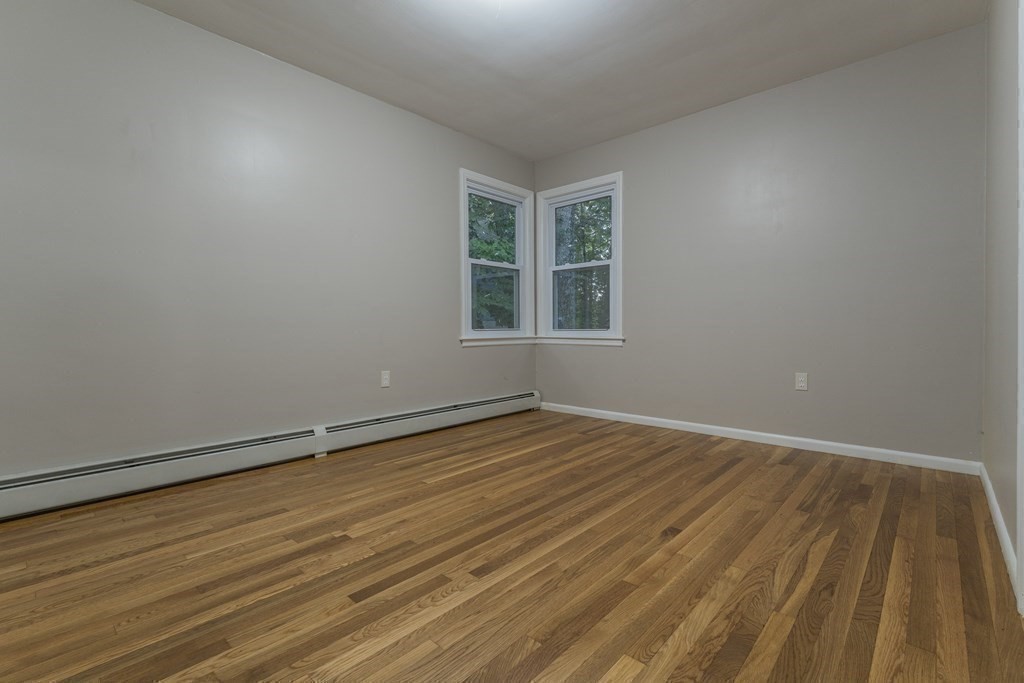 20 Laurelwood Road Rutland, MA 01543 - Photo 17 of 31 a view of an empty room with wooden floor and a window