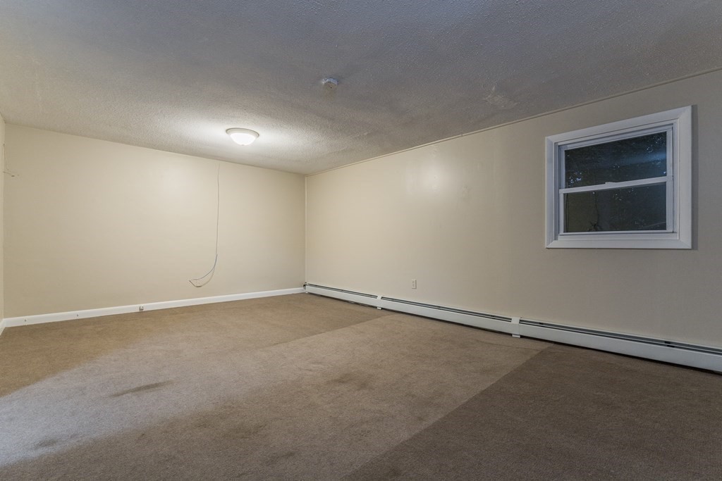 20 Laurelwood Road Rutland, MA 01543 - Photo 22 of 31 an empty room with a empty space and window
