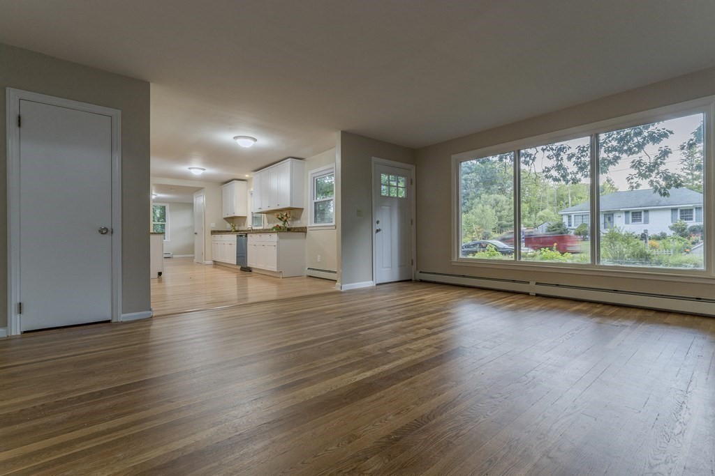 20 Laurelwood Road Rutland, MA 01543 - Photo 3 of 31 a view of empty room with wooden floor and a window