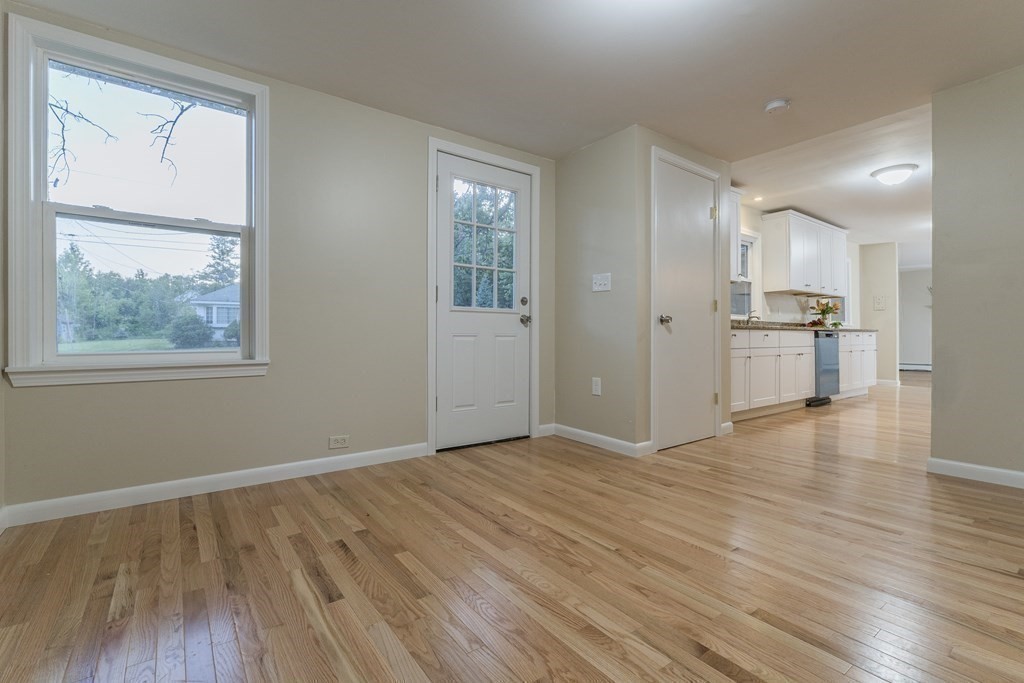 20 Laurelwood Road Rutland, MA 01543 - Photo 6 of 31 a view of empty room with wooden floor and windows