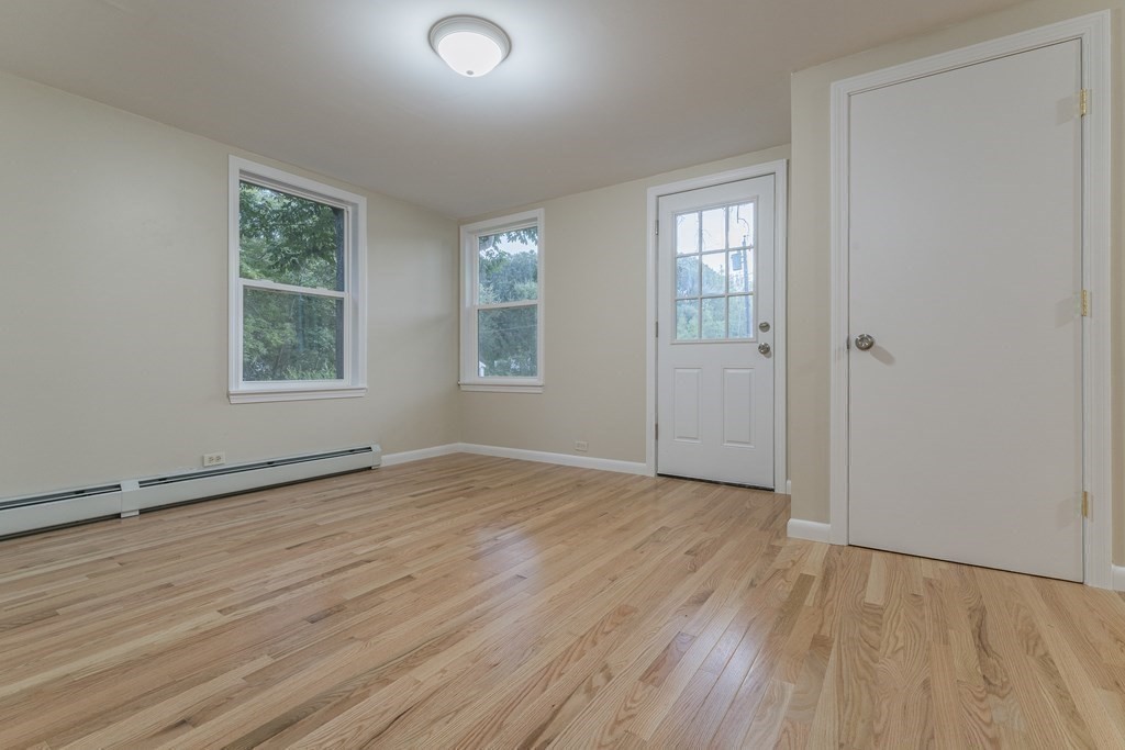20 Laurelwood Road Rutland, MA 01543 - Photo 7 of 31 an empty room with wooden floor and windows
