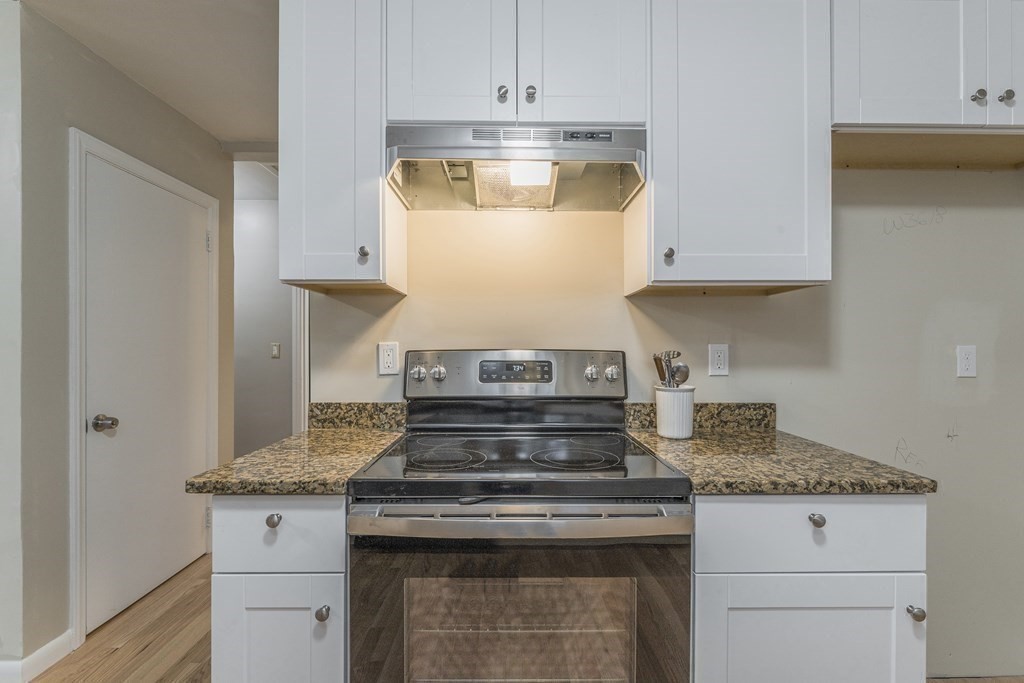 20 Laurelwood Road Rutland, MA 01543 - Photo 9 of 31 a stove top oven sitting inside of a kitchen