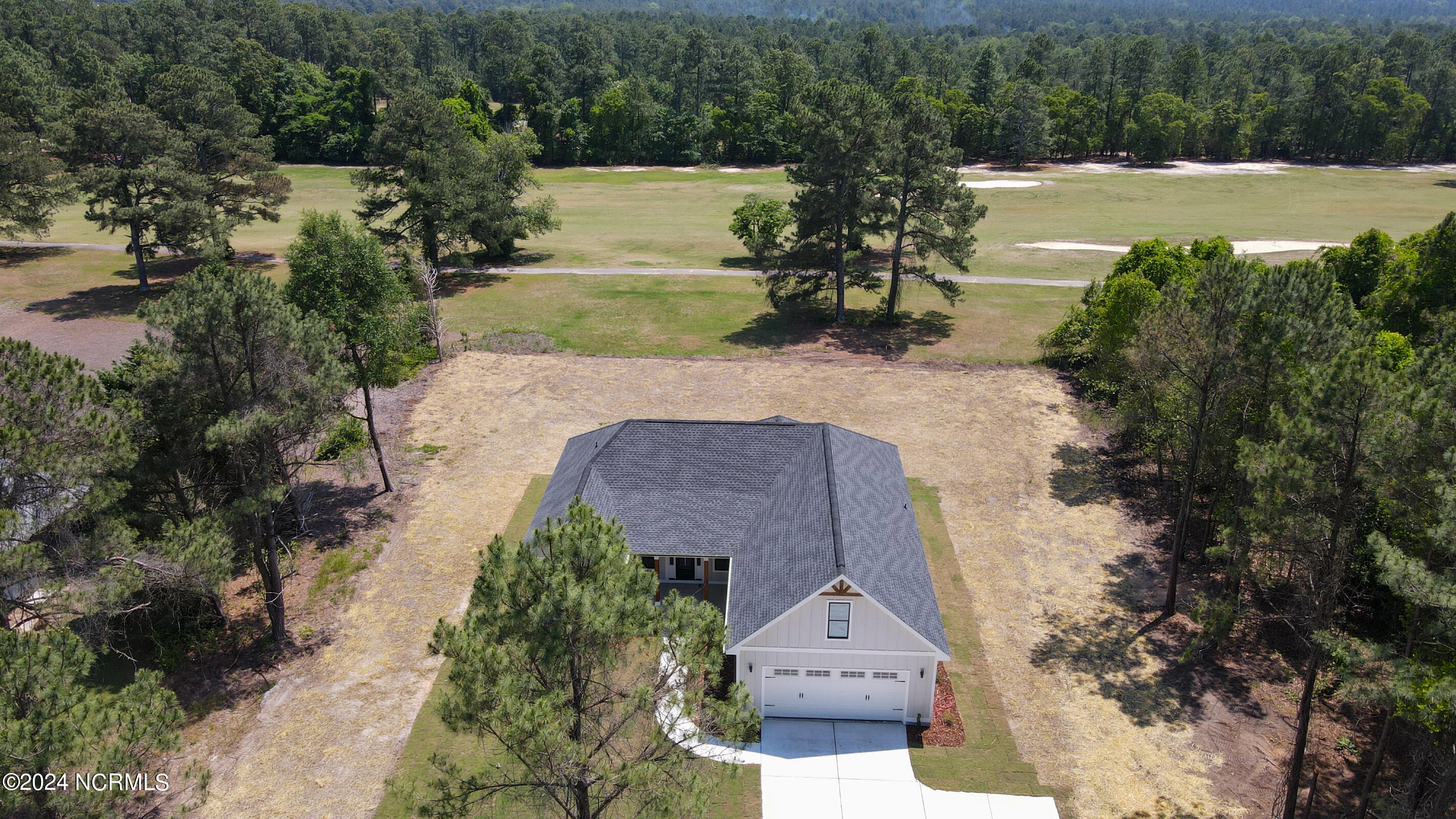 65 Richmond Road Jackson Springs, NC 27281 - Photo 32 of 36 dji_fly_20240507_134528_815_171510393956