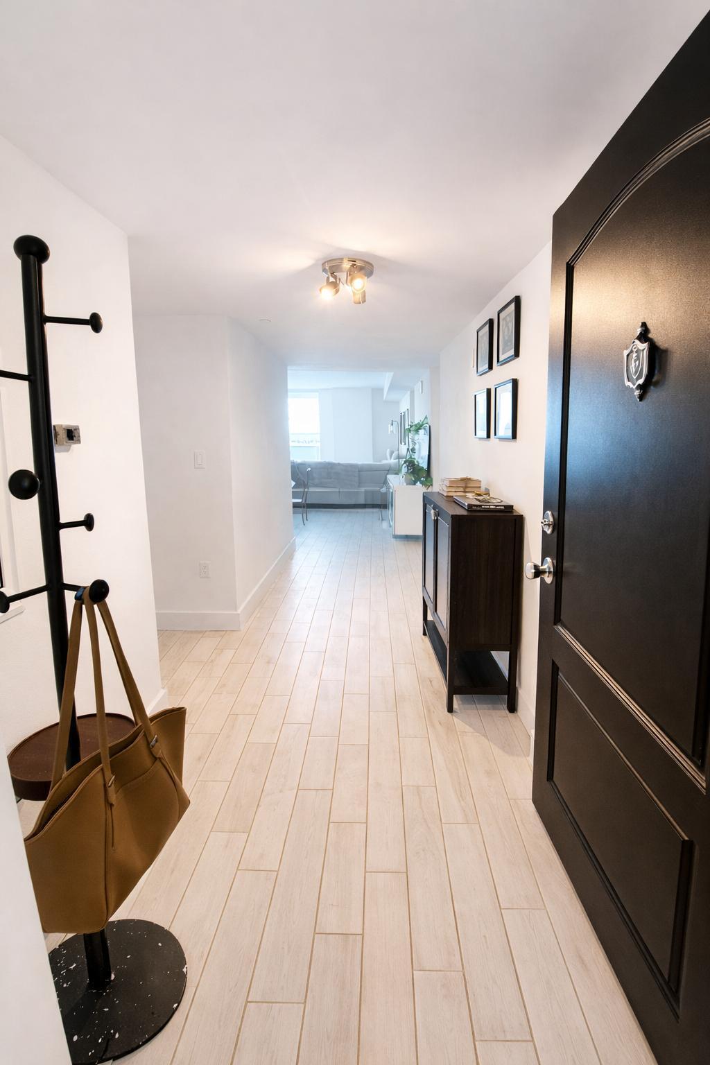 a view of living room with furniture and flat screen tv