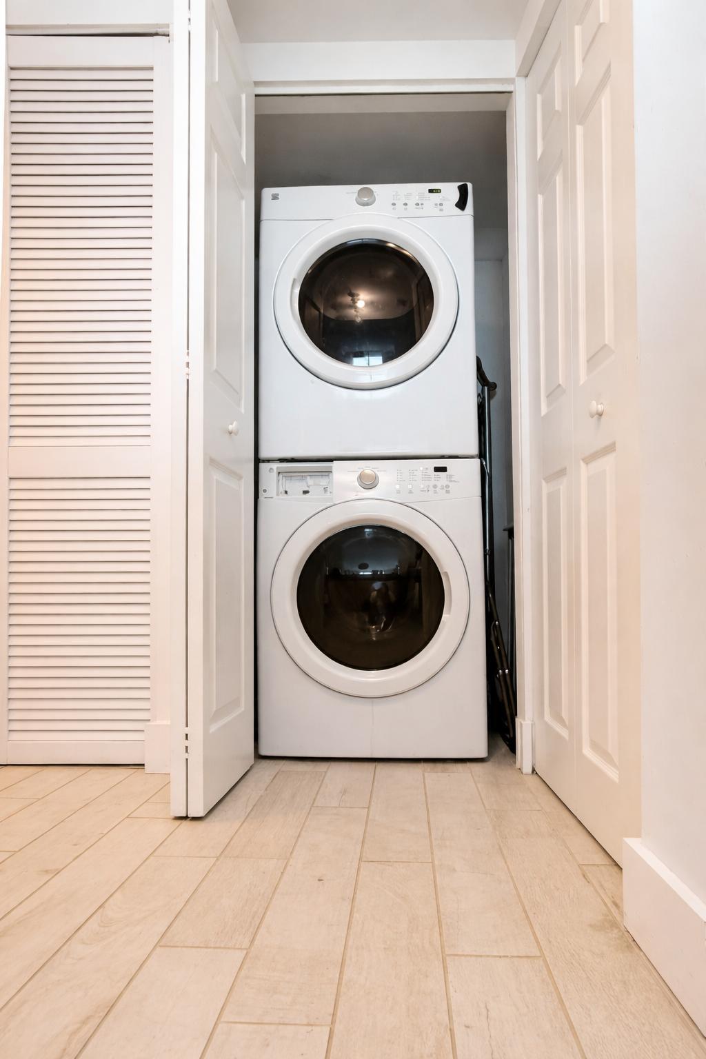 2101 Brickell Avenue, Unit 507 Miami, FL 33129 - Photo 3 of 25 a view of a storage & utility room with a washer and dryer