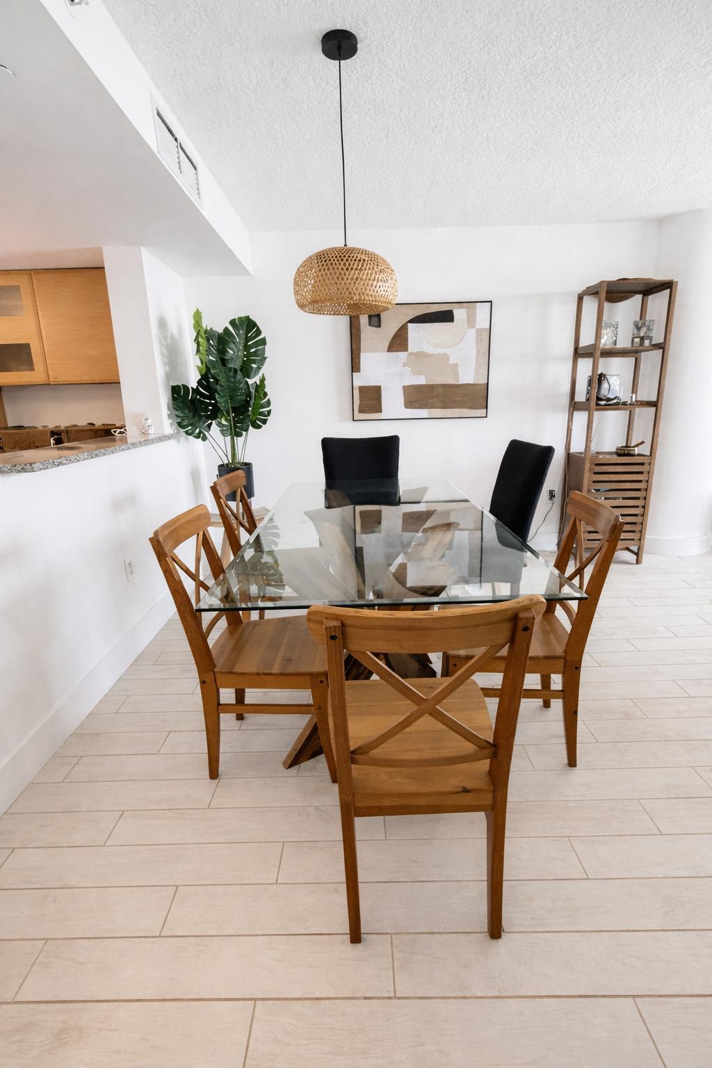 2101 Brickell Avenue, Unit 507 Miami, FL 33129 - Photo 4 of 25 a living room with furniture and a chandelier