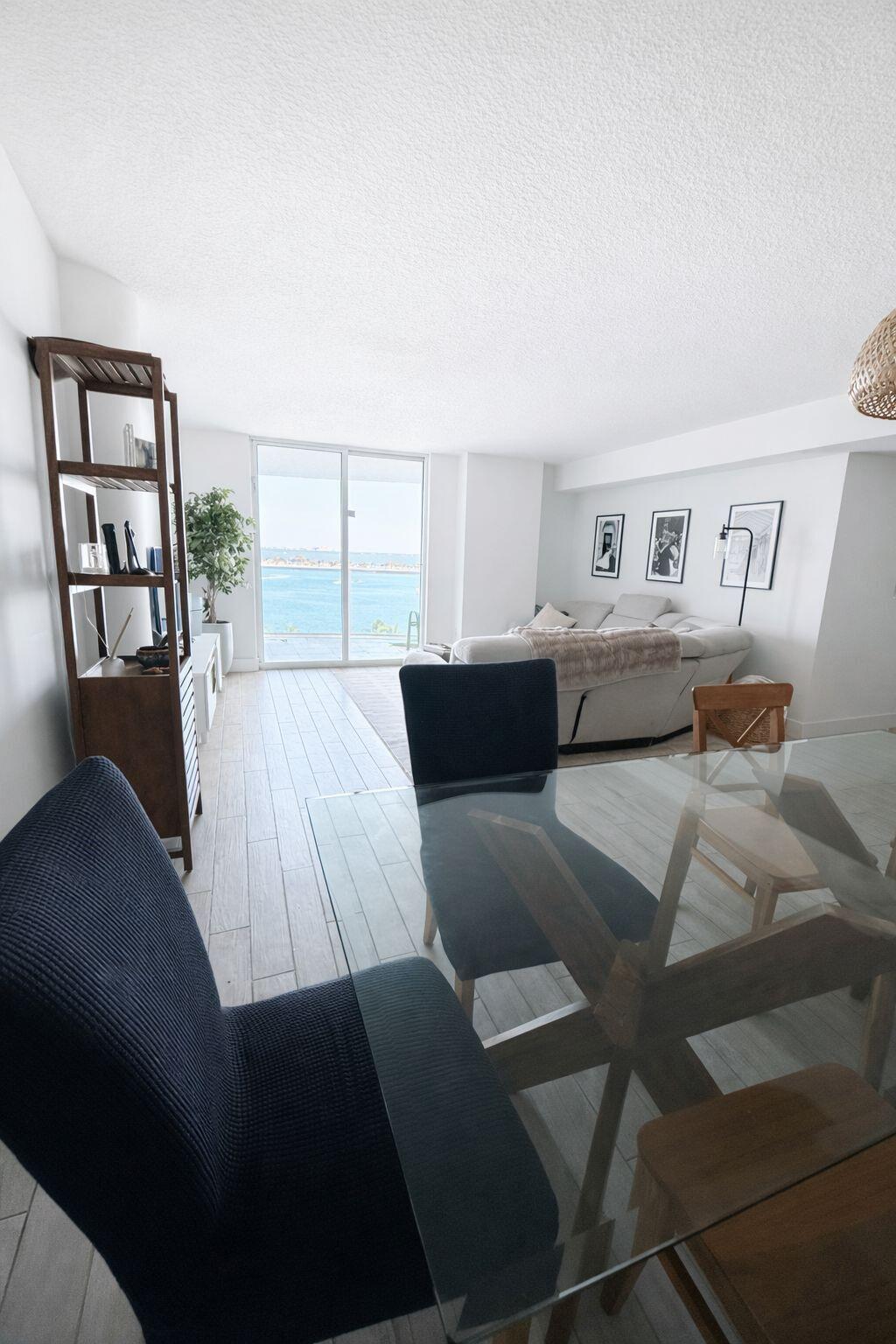 2101 Brickell Avenue, Unit 507 Miami, FL 33129 - Photo 7 of 25 a living room with furniture and a large window