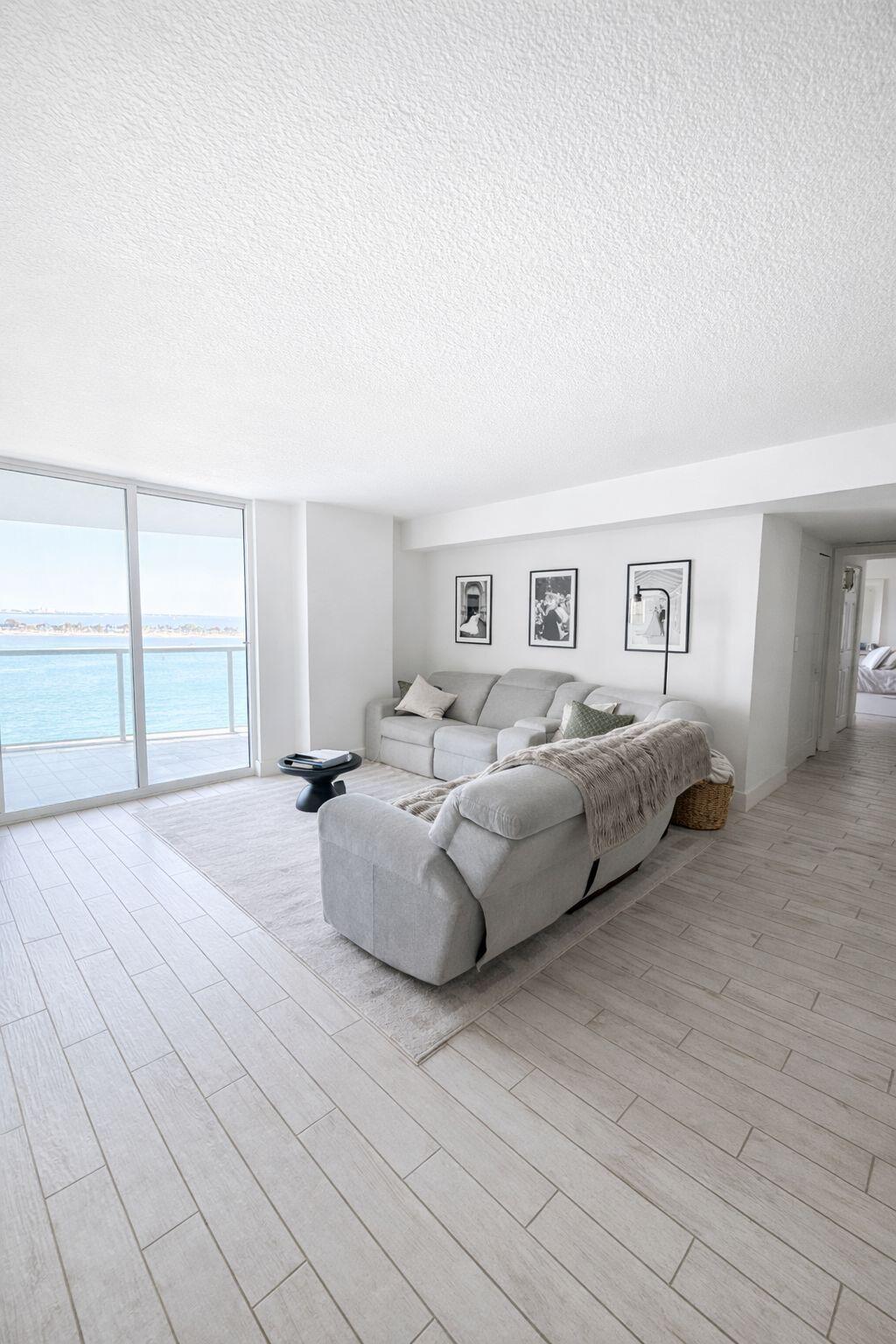 2101 Brickell Avenue, Unit 507 Miami, FL 33129 - Photo 8 of 25 a living room with furniture and a large window