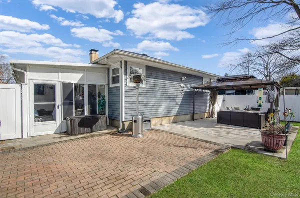 $529,000 | 58 Pentmoor Drive, Mastic, NY 11950