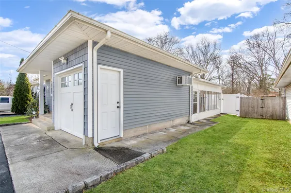 $529,000 | 58 Pentmoor Drive, Mastic, NY 11950
