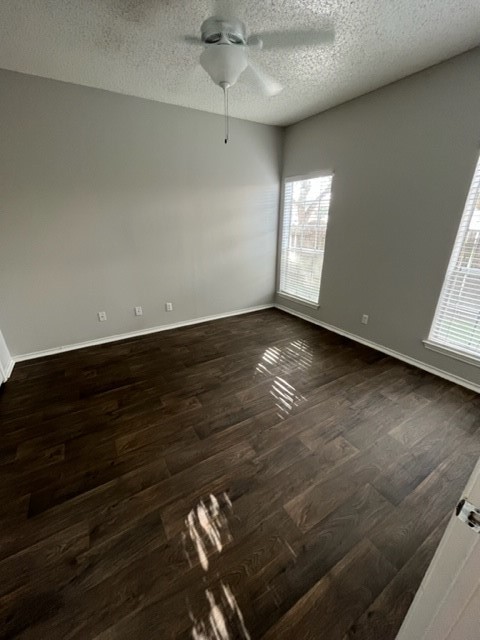 Undisclosed Address Corpus Christi, TX 78413 - Photo 7 of 11 an empty room with wooden floor and windows