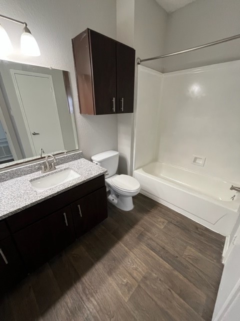 Undisclosed Address Corpus Christi, TX 78413 - Photo 8 of 11 a bathroom with a double vanity sink and a mirror