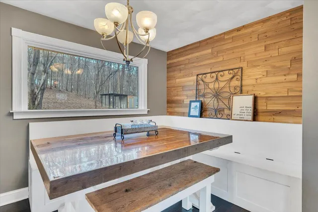 a bathroom with a sink and a large mirror