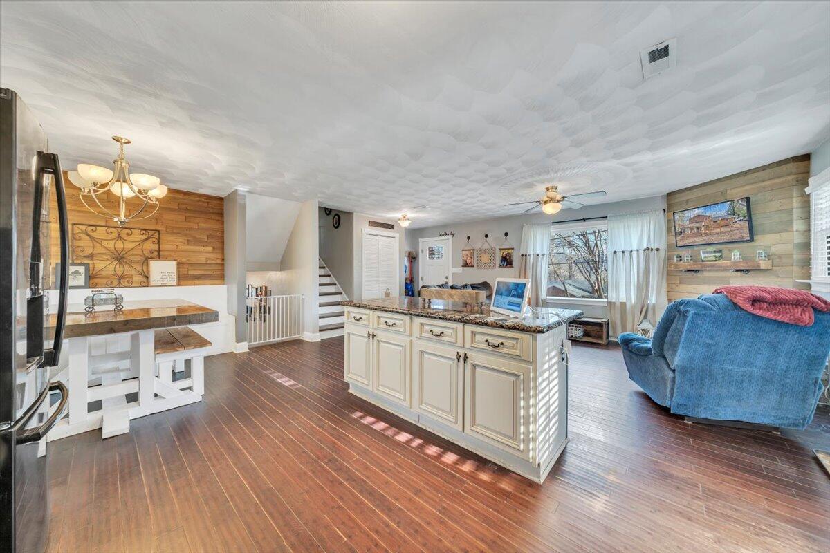 2166 Ruritan Road Roanoke, VA 24012 - Photo 15 of 46 a kitchen with stainless steel appliances granite countertop a stove and cabinets