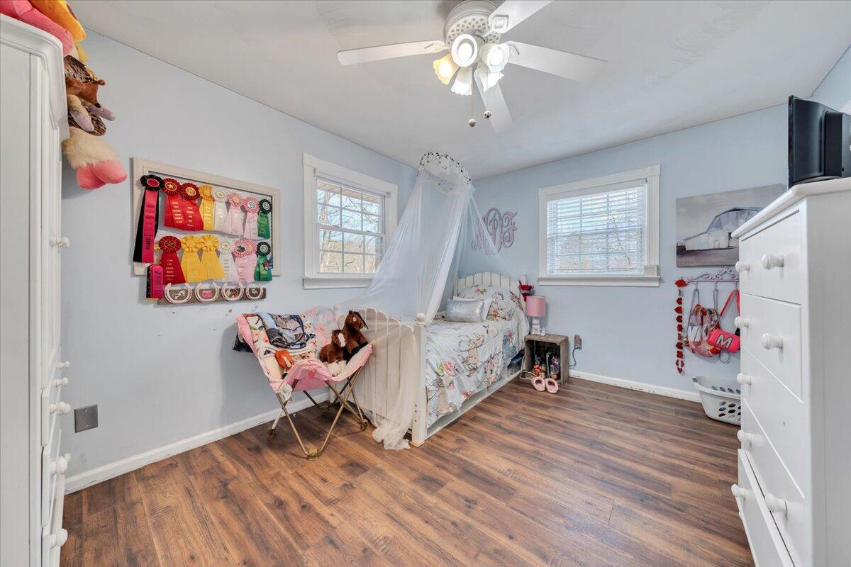 2166 Ruritan Road Roanoke, VA 24012 - Photo 24 of 46 a bed room with a bed and a chandelier