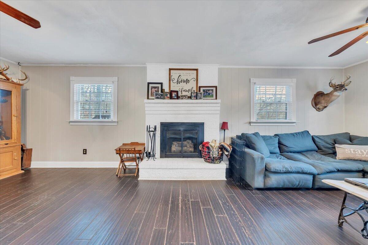 2166 Ruritan Road Roanoke, VA 24012 - Photo 26 of 46 a living room with furniture and a fireplace