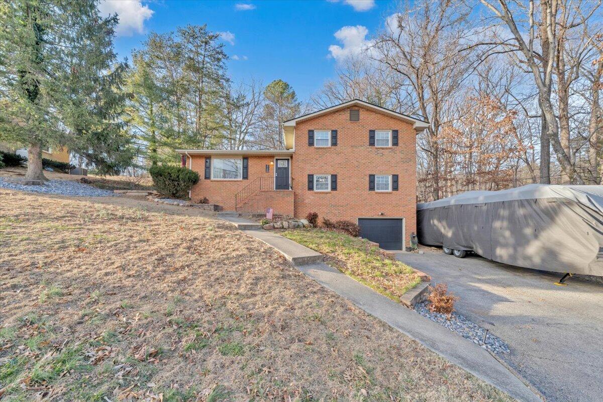2166 Ruritan Road Roanoke, VA 24012 - Photo 4 of 46 a front view of a house with a yard
