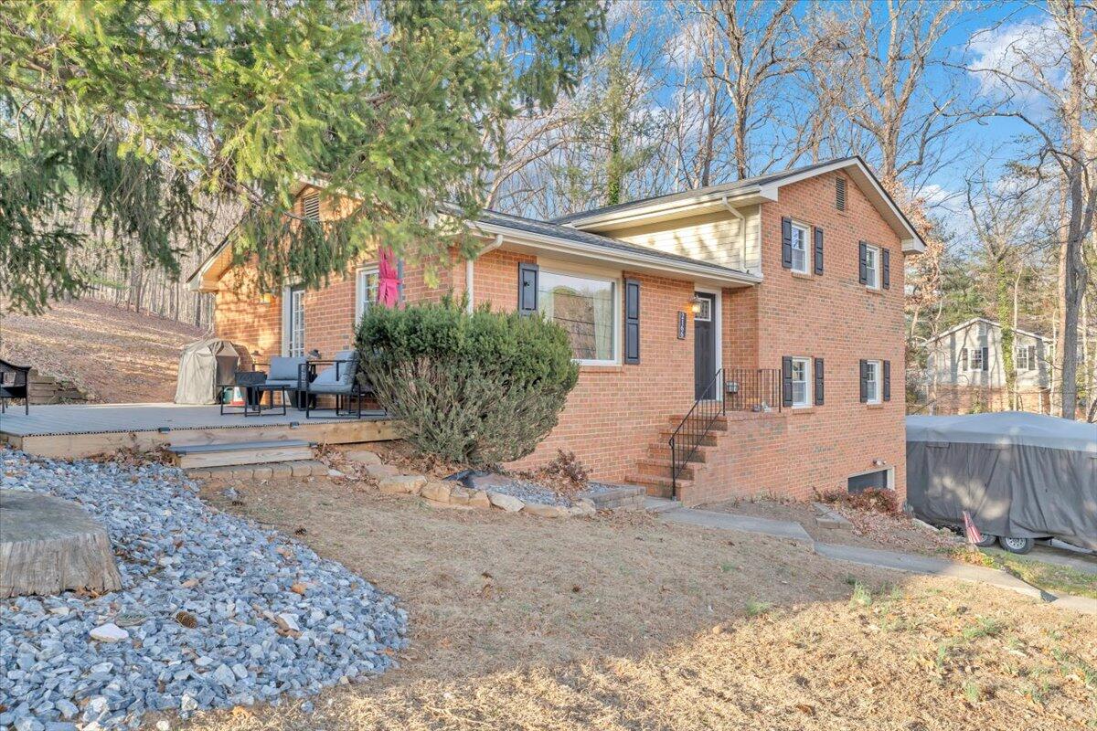 2166 Ruritan Road Roanoke, VA 24012 - Photo 45 of 46 a view of a house with a yard covered in snow