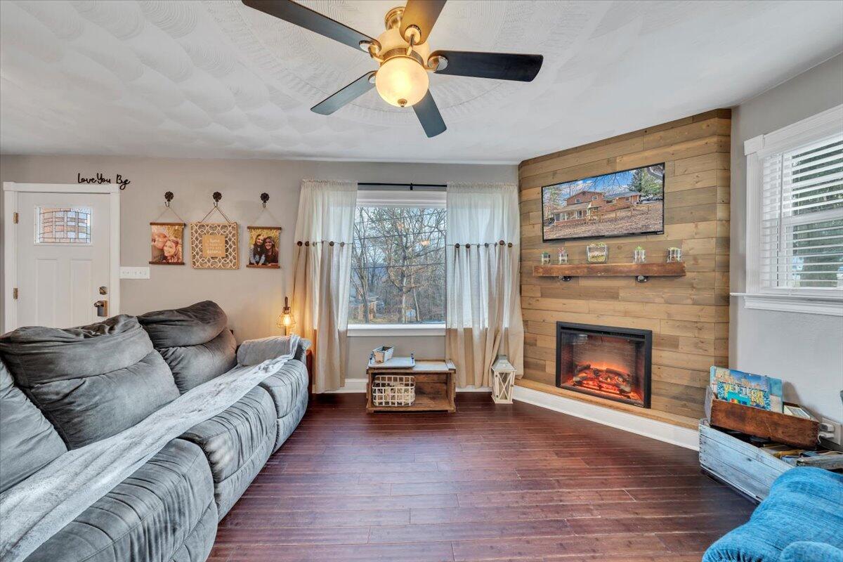 2166 Ruritan Road Roanoke, VA 24012 - Photo 8 of 46 a living room with furniture and a fireplace