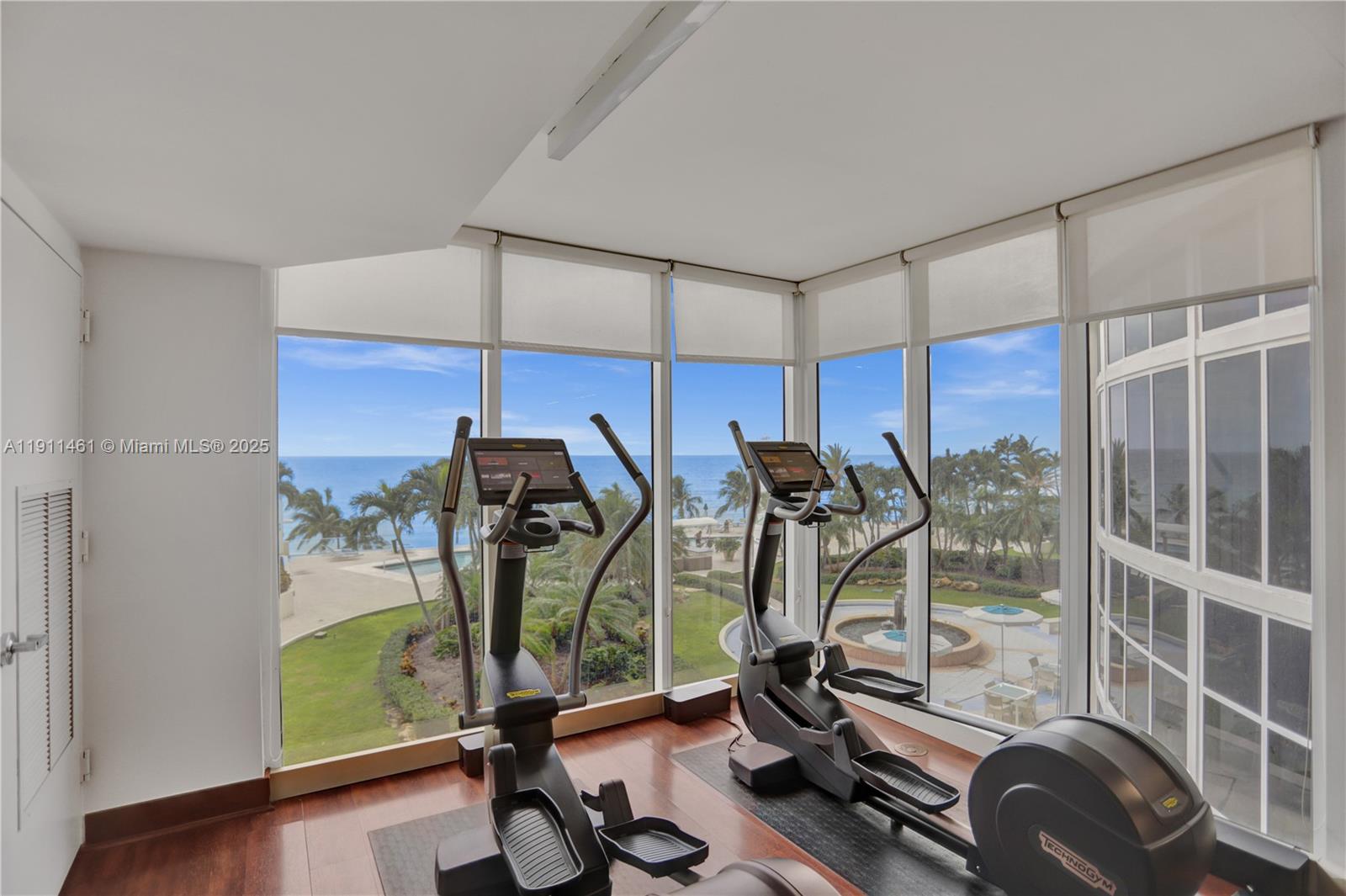 19111 Collins Avenue, Unit 1602 Sunny Isles Beach, FL 33160 - Photo 70 of 93 a view of a room with gym equipment