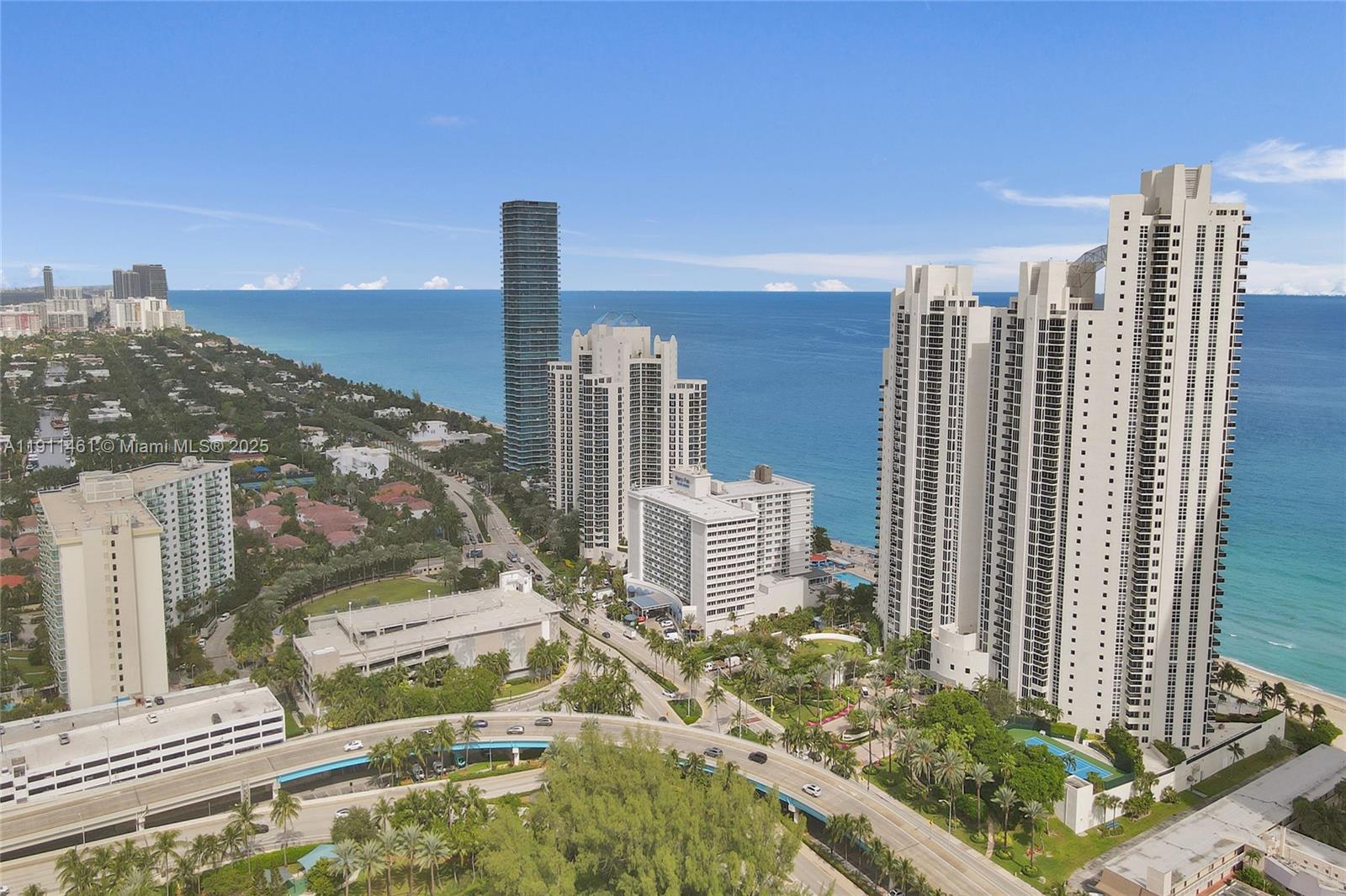 19111 Collins Avenue, Unit 1602 Sunny Isles Beach, FL 33160 - Photo 85 of 93 a city view with tall buildings