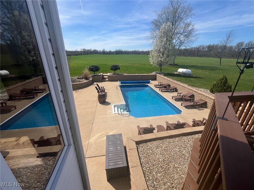 2159 Alliance Road Deerfield, OH 44411 - Photo 6 of 33 Pool with a yard and a patio