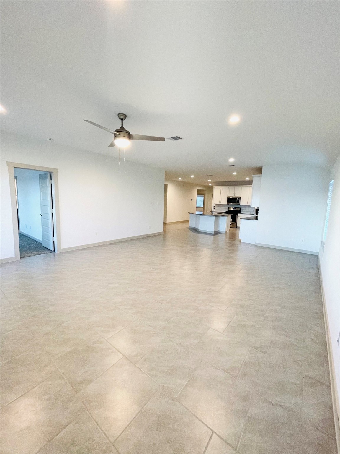 28935 Yachting Point Lane Katy, TX 77494 - Photo 4 of 38 a view of empty room with wooden floor